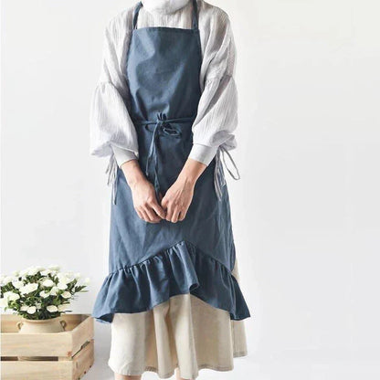 A nordic-inspired linen pleated apron with an adjustable design, perfect for baristas and home chefs in New Zealand.