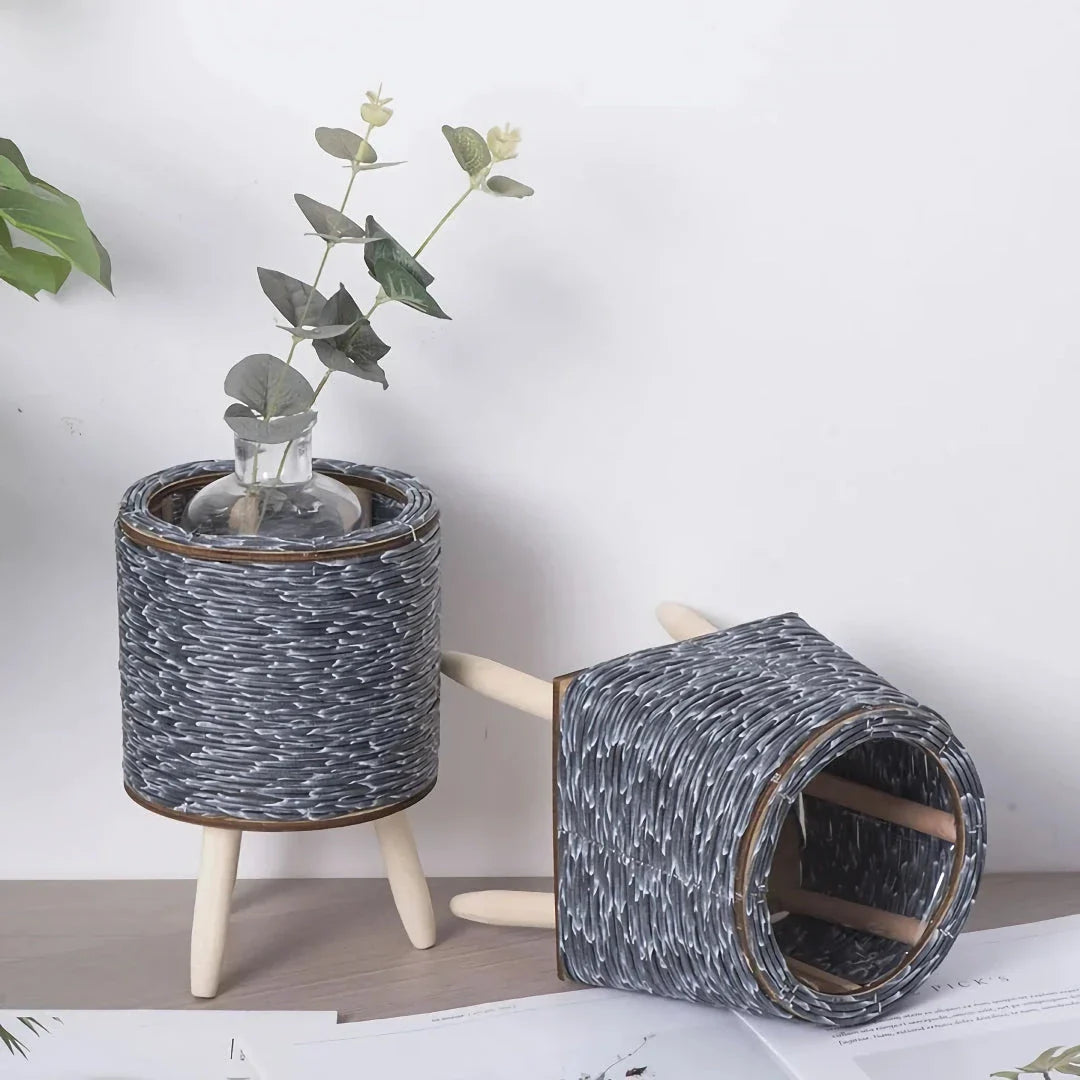 Hand-woven rattan planter with lush greenery, perfect for indoor and outdoor display