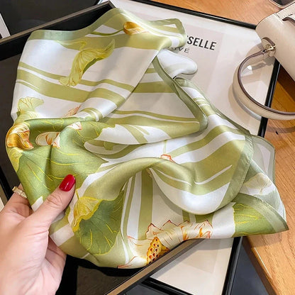 Elegant pure silk square scarf in a lush green color, perfect for adding a touch of sophistication to any Kiwi's wardrobe