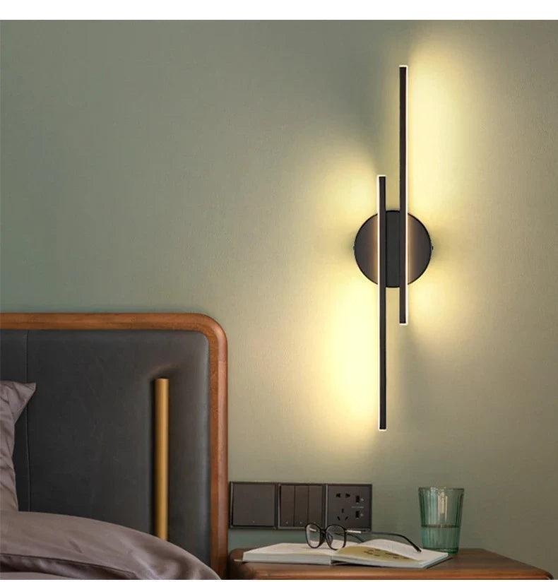 Stylish double linear LED wall light in black, creating warm and cosy ambience in a modern Kiwi home