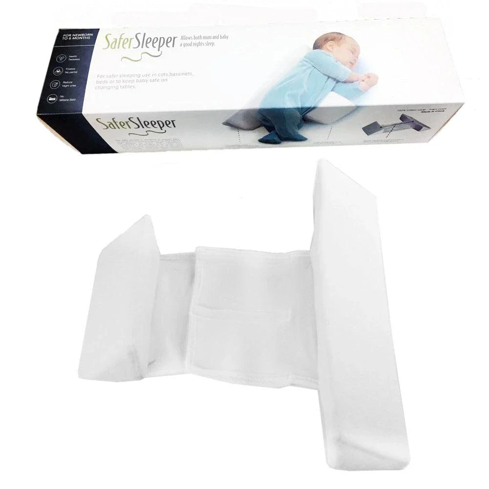 Ergonomic newborn baby sleep pillow with triangular design and removable pillowcase for comfortable, supported side sleeping