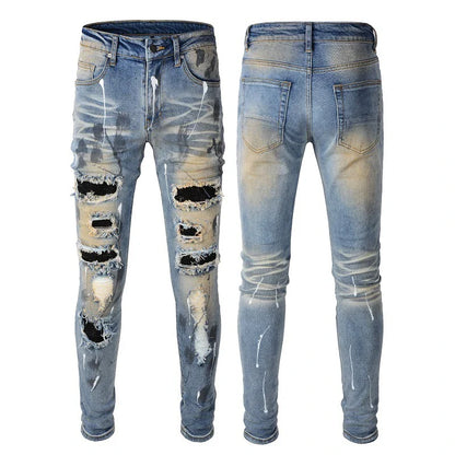 Vintage-inspired jeans with rhinestone and ink splash detailing, perfect for the modern Kiwi lifestyle