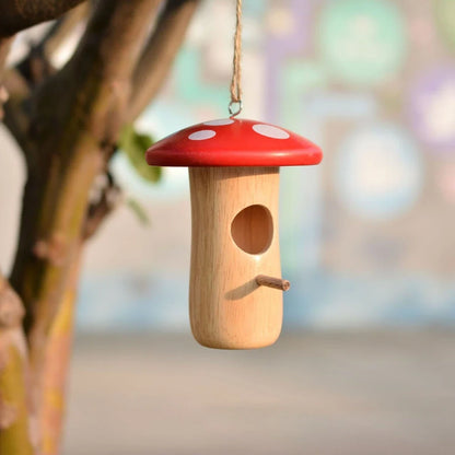 Charming wooden hummingbird nest in a Kiwi garden, designed to attract and shelter local bird species