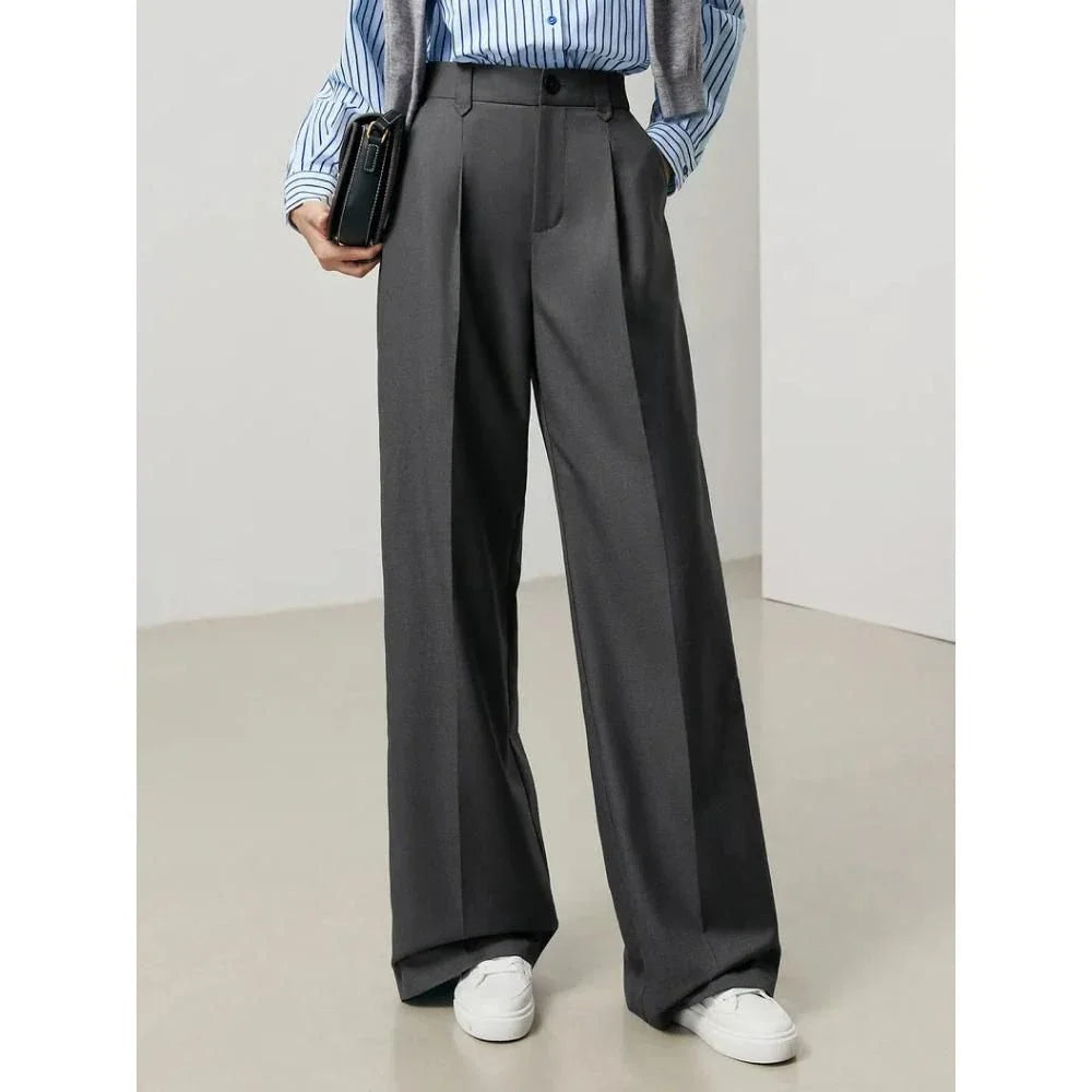 Versatile high-waist wide-leg grey trousers for Kiwi women, offering a chic and comfortable design.
