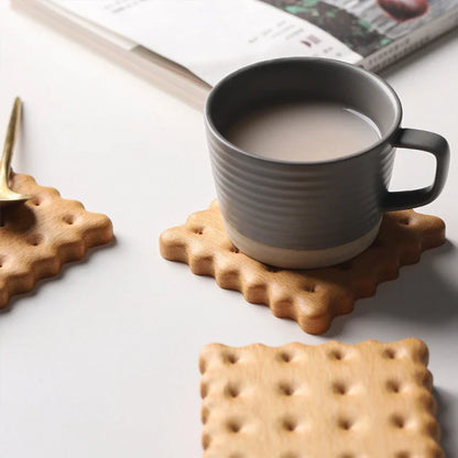 Natural wooden cookie-shaped coasters in beige and brown, handcrafted in New Zealand from premium solid wood