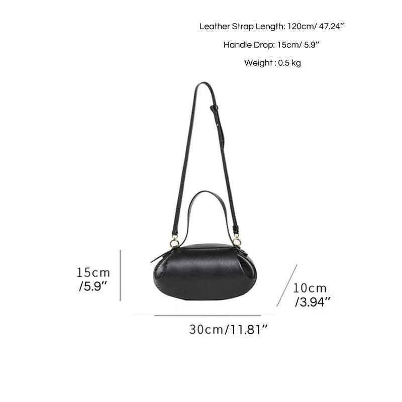 A stylish circular vegan leather handbag with a unique rugby-inspired design, perfect for Kiwi fashion enthusiasts