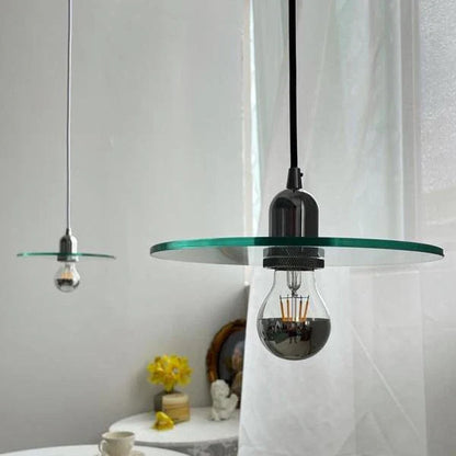 Elegant modern glass pendant light with a white shade, perfect for dining rooms, bedrooms, and other living spaces.