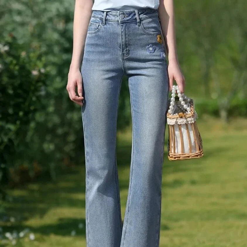 Light blue embroidered high-waisted jeans with a modern, versatile design for Kiwi women's summer fashion