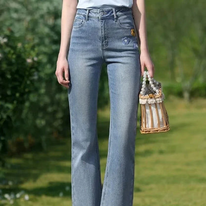 Light blue embroidered high-waisted jeans with a modern, versatile design for Kiwi women's summer fashion