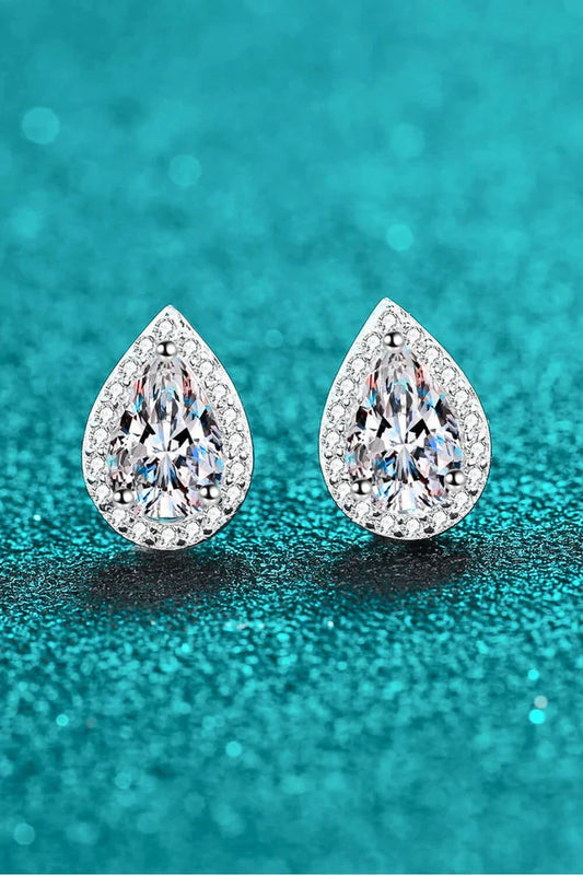 Pair of moissanite teardrop stud earrings made of 925 sterling silver with a polished finish and rhodium plating