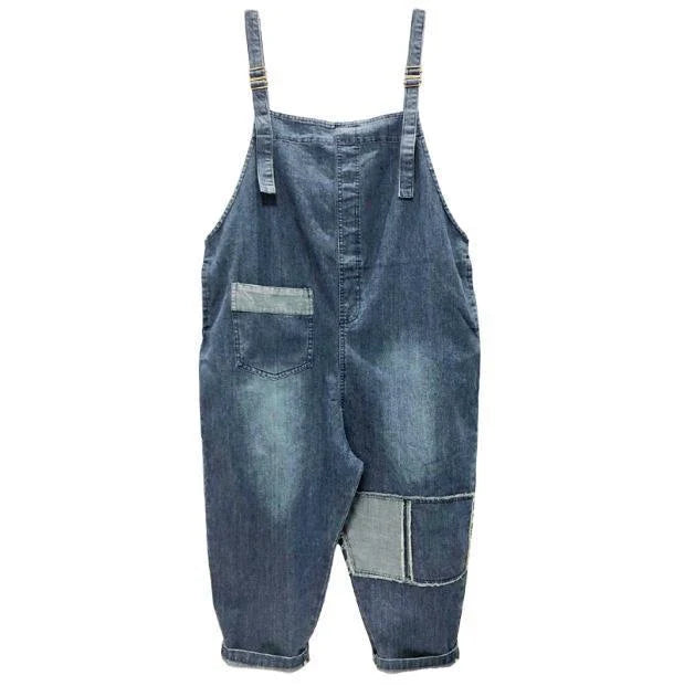 Women's plus-size denim overalls featuring a sustainable, high-waist design with distressed detailing