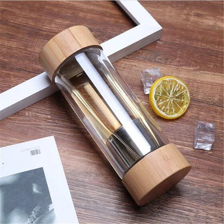 Sustainable glass water bottle with stainless steel tea infuser, made with eco-friendly materials for active New Zealanders