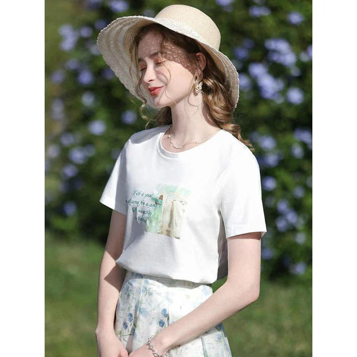 Embroidered casual summer tee for women in white with elegant graphic pattern