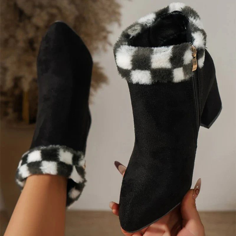 A pair of stylish plaid print plush ankle boots with a square heel, designed for warm and comfortable winter wear.