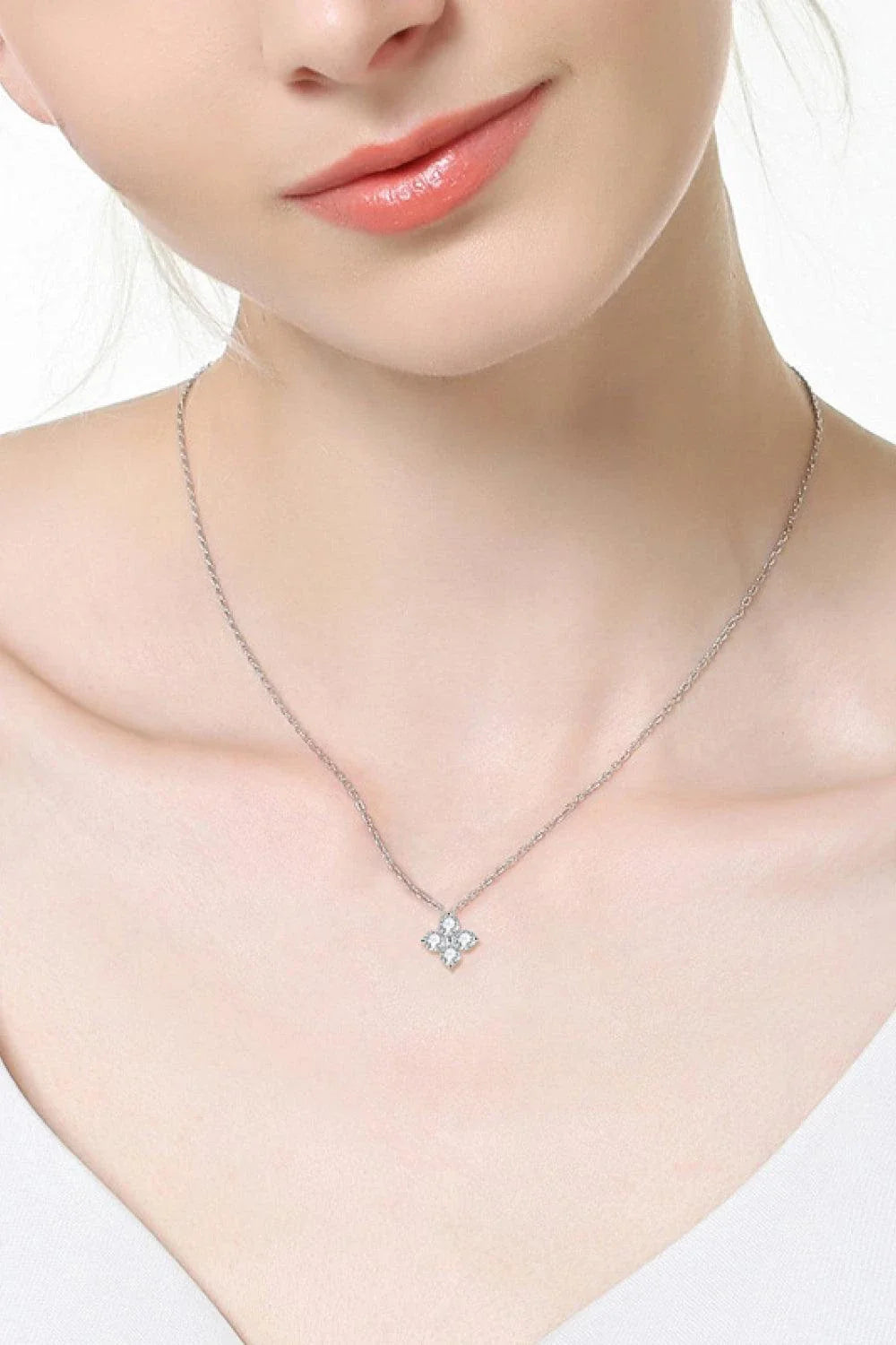 Elegant moissanite four-leaf clover pendant necklace with 925 sterling silver chain