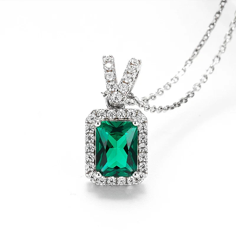 Gleaming emerald clavicle necklace with 925 sterling silver chain and adjustable length