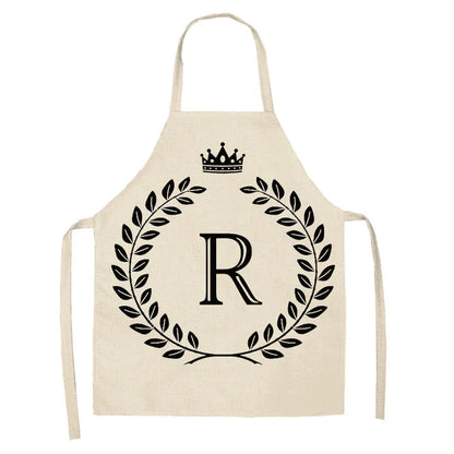 A crown and letter printed kitchen apron made of high-quality cotton and linen, suitable for both men and women in New Zealand kitchens.