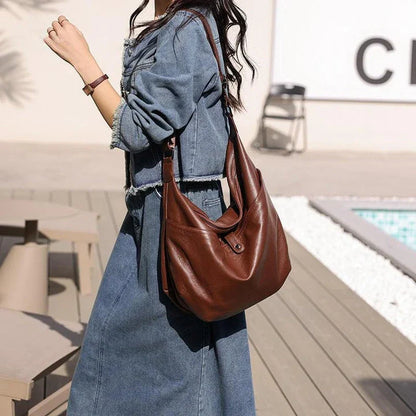 Premium genuine leather crossbody hobo bag with unique stone pattern, ideal for everyday Kiwi style