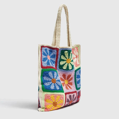 Stylish floral crochet shoulder bag with a bohemian flair, perfect for summer adventures in New Zealand