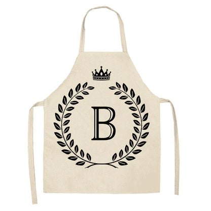 A crown and letter printed kitchen apron made of high-quality cotton and linen, suitable for both men and women in New Zealand kitchens.