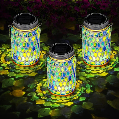 Handcrafted solar-powered outdoor mason jar lamp in a blue color, providing warm, ambient lighting for Kiwi backyard and patio