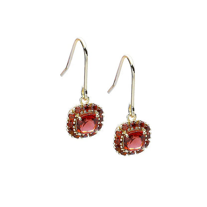 Stylish red pomegranate-inspired earrings made from premium silver with a modern, geometric design