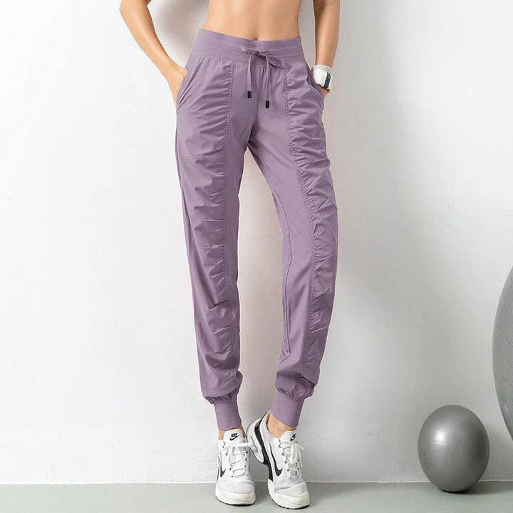 Comfortable and versatile sports pants for active Kiwi women, featuring a relaxed fit, drawstring waist, and convenient pockets.