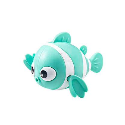 Cartoon fish wind-up bath toy in green, designed for New Zealand toddlers to enjoy during bathtime