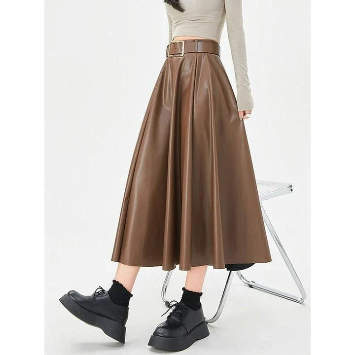 Elegant high-waist faux leather skirt with stylish belt, perfect for office or casual wear