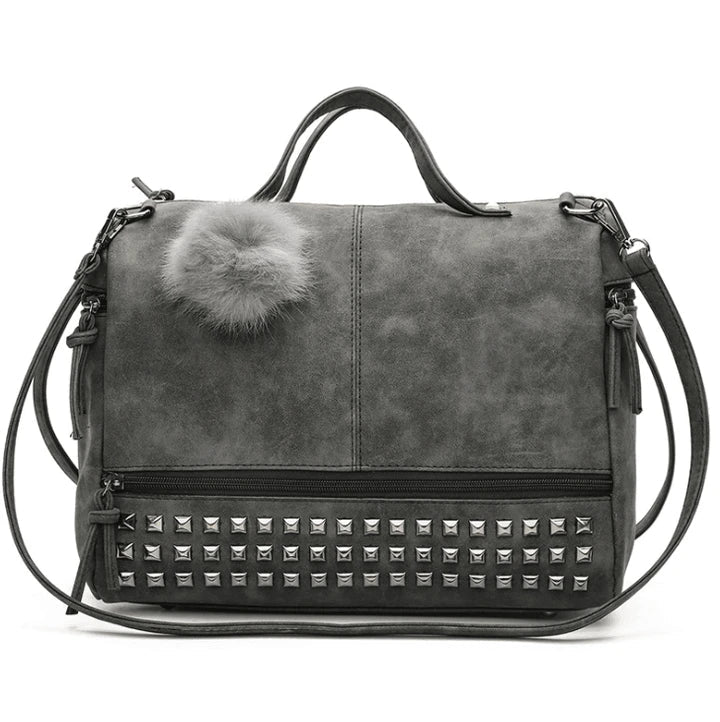 Stylish autumn pillow bag in matte PU leather with rivet detailing, ideal for Kiwi women's fashion