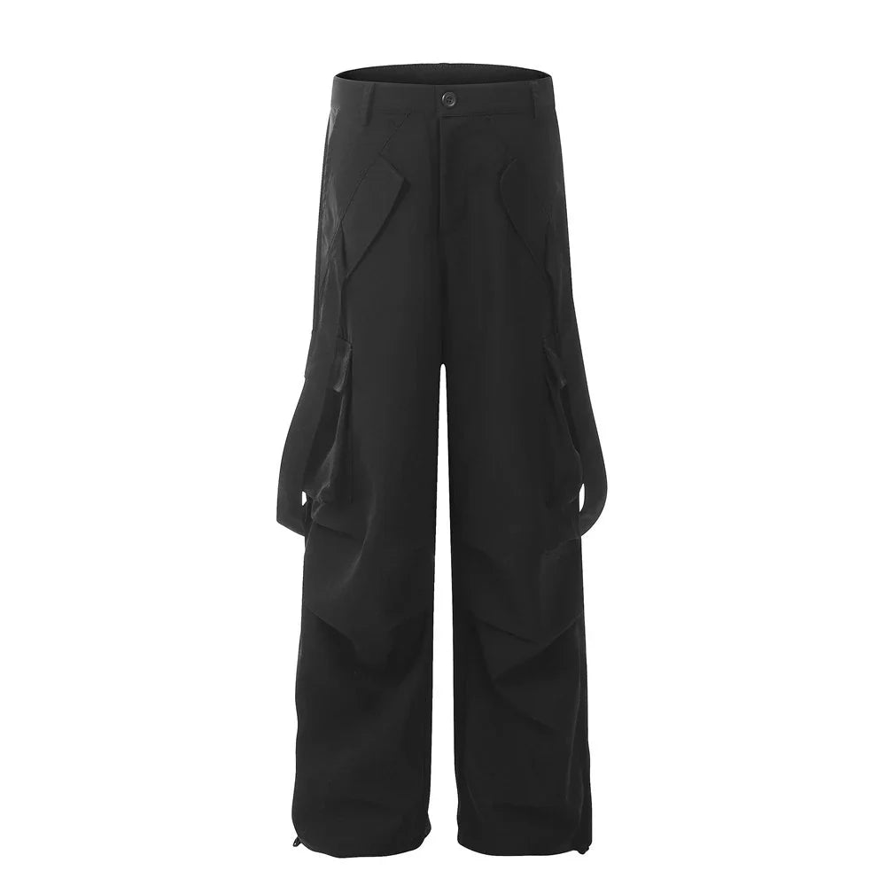 Stylish black overalls with pleated pockets, designed for the active Kiwi lifestyle