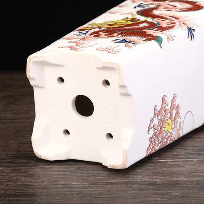 Stylish square ceramic planter in white, suitable for growing asparagus fern, orchids, and herbs on balconies or patios.