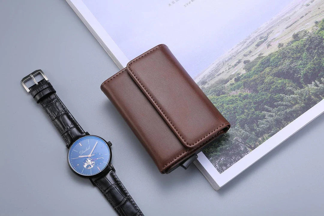 A stylish tri-fold wallet in classic Kiwi-friendly colours, featuring a magnetic buckle closure, anti-theft protection, and a sleek square vertical design