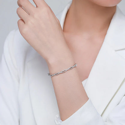 Wave-shaped silver bracelet with adjustable sizes, crafted with premium materials and innovative technology