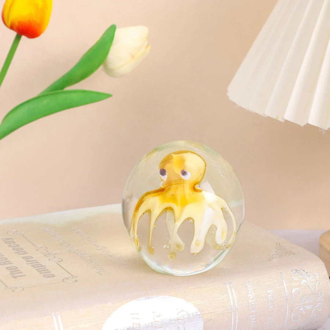 Handcrafted glass octopus windshield washer fluid ornament in ocean blue and tea brown colours, made in New Zealand