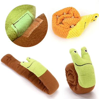 Soft, plush snail-shaped snuffle mat toy for dogs, with multiple treat-hiding pockets and a built-in sound generator for added engagement and mental stimulation.