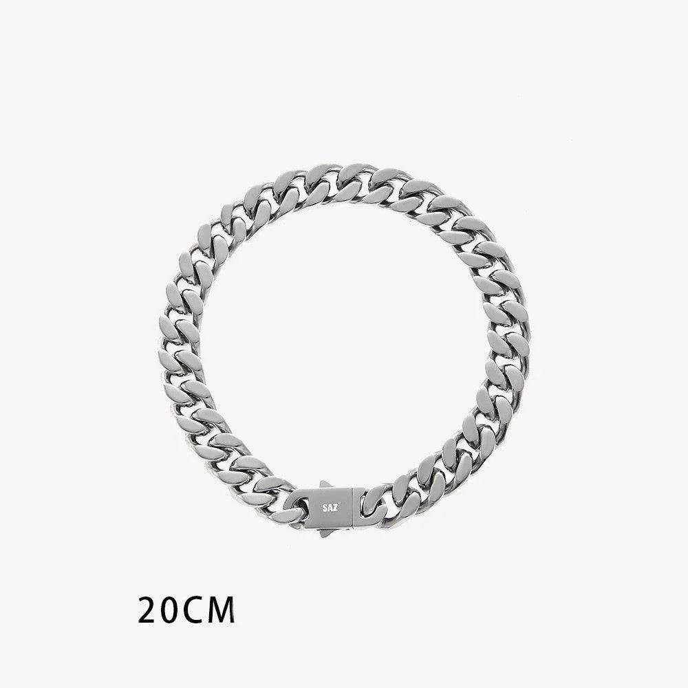 Stylish titanium steel bracelet with Cuban-inspired design, adjustable length, and polished finish.