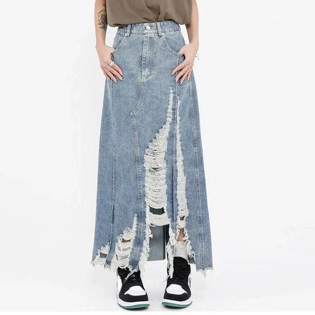 High-waisted denim skirt with unique pattern of holes and irregular burrs, made from premium cotton-polyester blend