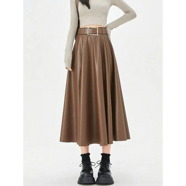 Elegant high-waist faux leather skirt with stylish belt, perfect for office or casual wear