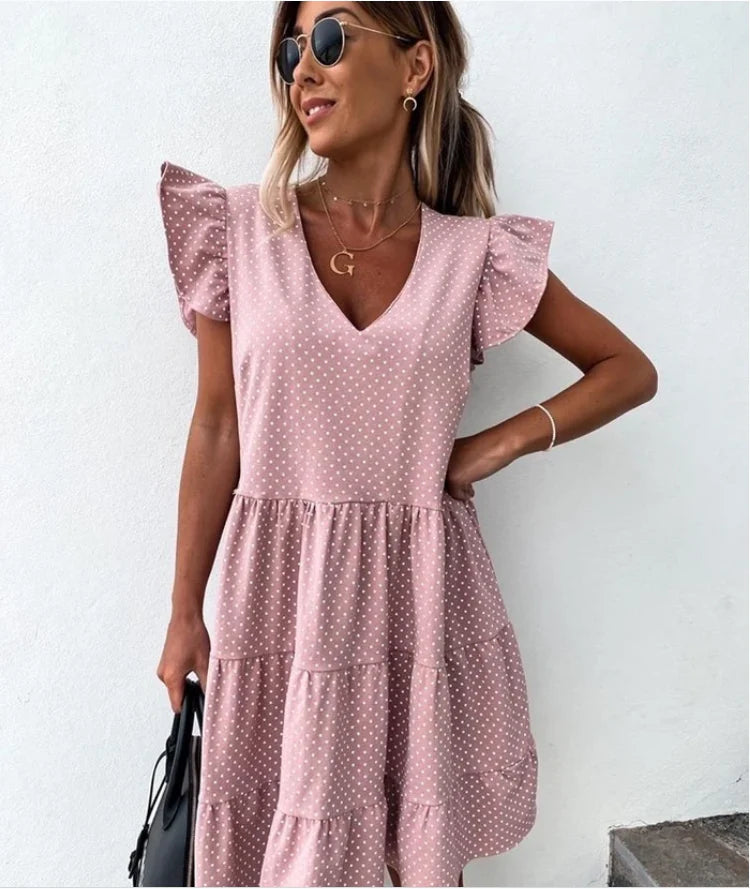 Vibrant digital print V-neck dress with ruffled detailing and flowing silhouette