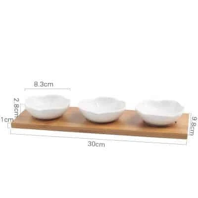 Stylish ceramic snack trays with natural wood pallet, perfect for serving nibbles and entertaining in Kiwi-style homes