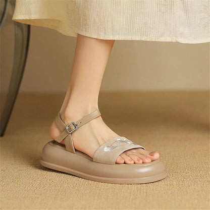 Embroidered platform sandals with kid suede upper and durable TPU outsole, designed for everyday comfort and style.