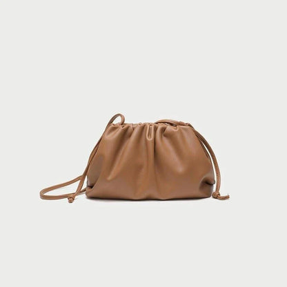 Elegant soft PU leather crossbody bag in a timeless brown colour, featuring a versatile design and premium quality construction.