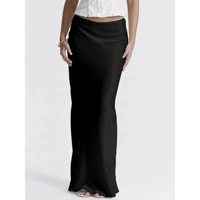 Elegant high-waisted satin maxi skirt in black, a timeless and sophisticated wardrobe essential for the modern Kiwi woman.