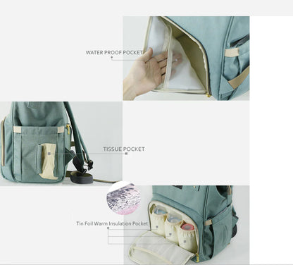 Stylish and practical mummy bag with reinforced handles, durable buckles, and separate bottling area for Kiwi mums