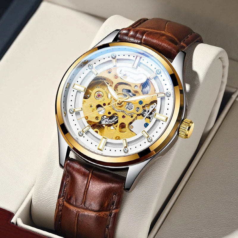 Gold-tone mechanical watch with a white or black leather strap, featuring a sleek and elegant design perfect for the Kiwi lifestyle.