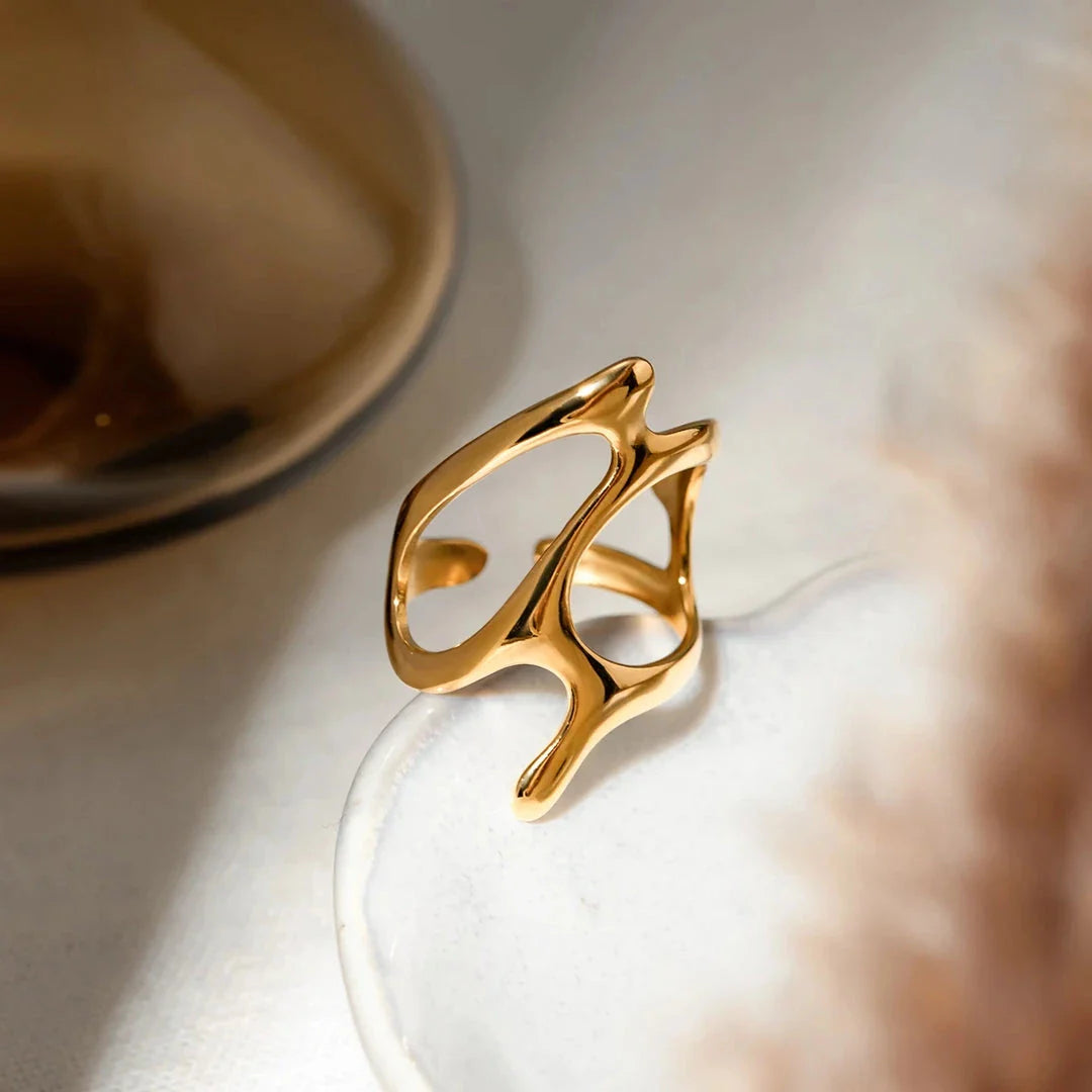 Chic stainless steel ring with irregular geometry design and 18K gold plating, a durable and stylish accessory for everyday wear