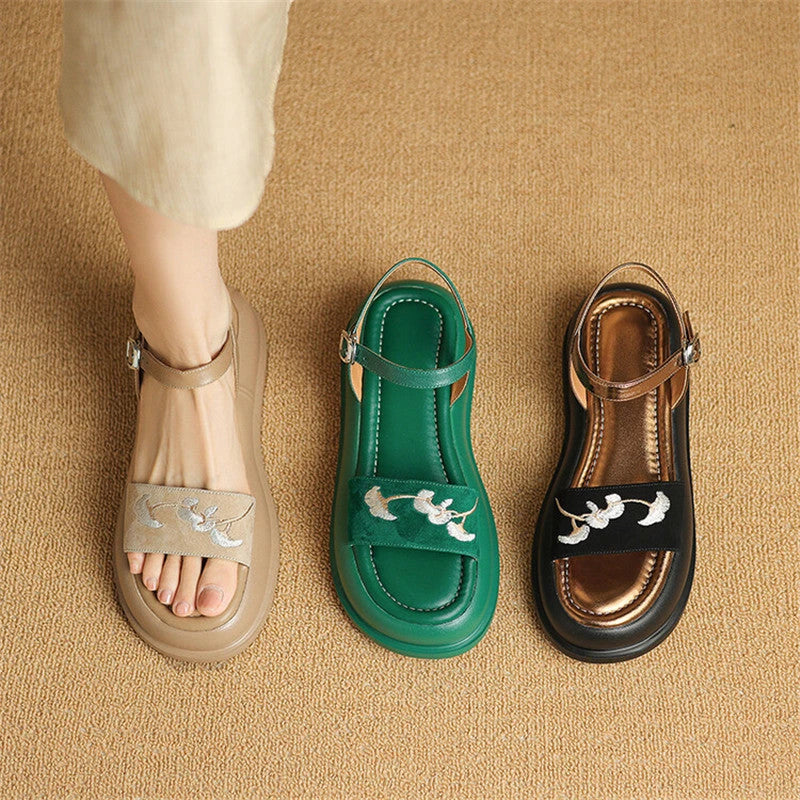 Embroidered platform sandals with kid suede upper and durable TPU outsole, designed for everyday comfort and style.