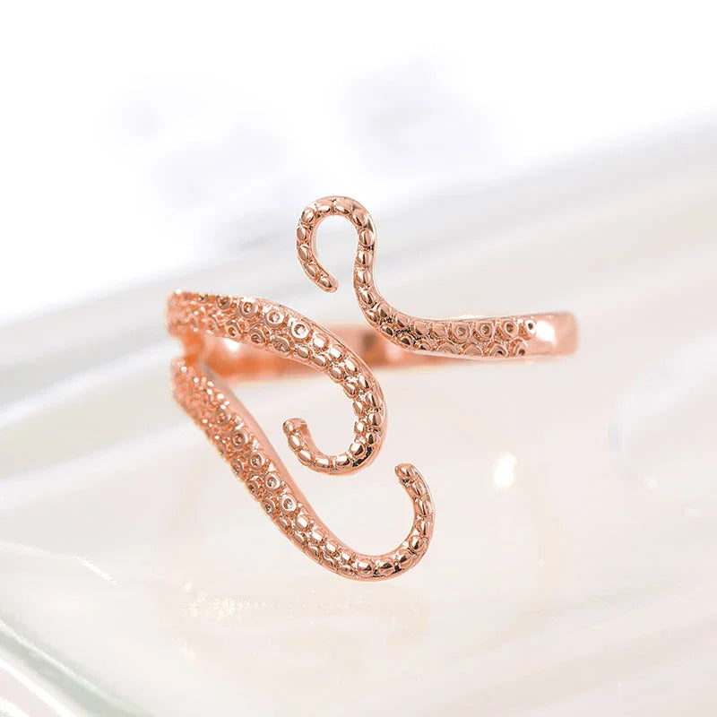 Adjustable octopus tentacle wrap ring in gold, a unique and versatile accessory for Kiwis