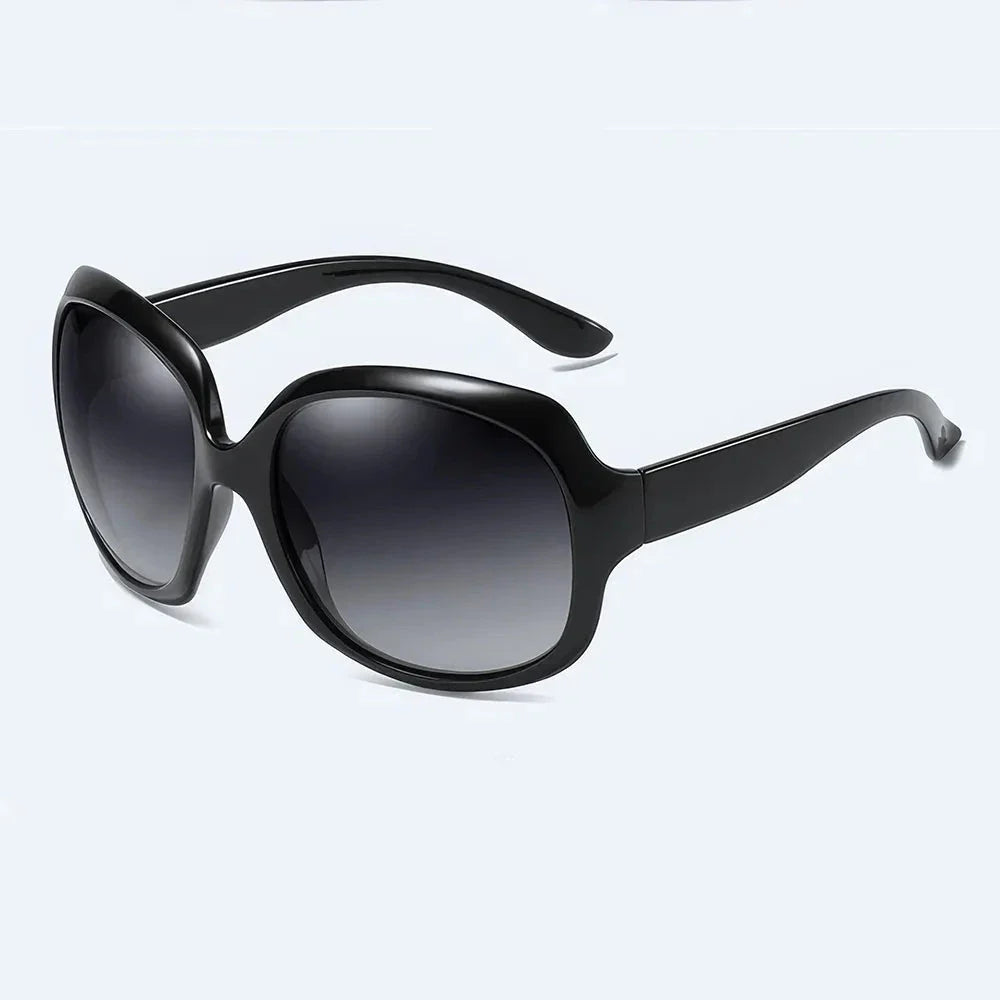 Elegant oversized polarized sunglasses with gradient tint, offering UV protection and style for Kiwi fashionistas